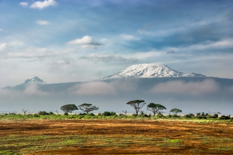 Mount Kilimanjaro above the plains of Tanzania, and further from the centre of Earth than Everest is.